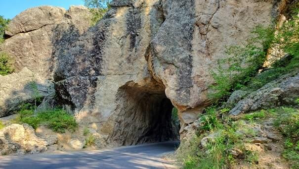 Driving through cc gideon tunnel. iron mountain road. south dakota travel blog
