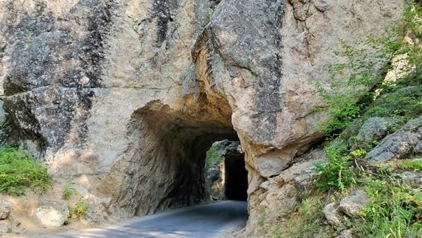 Driving through cc gideon tunnel. iron mountain road. south dakota travel blog