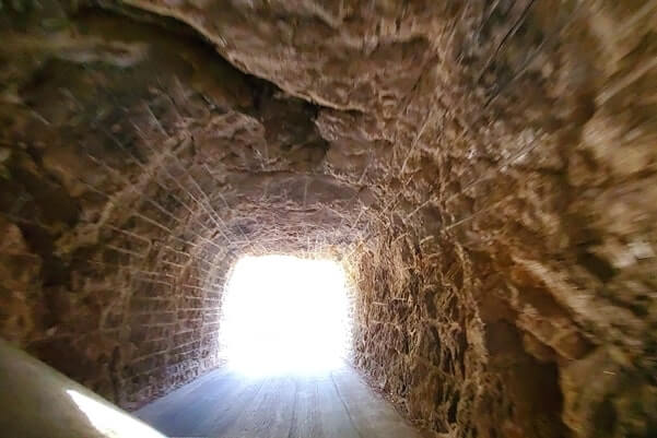 Driving through cc gideon tunnel. iron mountain road. south dakota travel blog