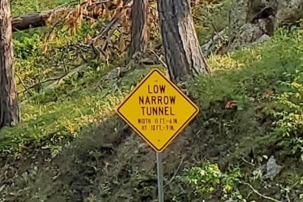 CC Gideon Tunnel is a low narrow tunnel on Iron Mountain Road. black hills national forest. south dakota travel blog
