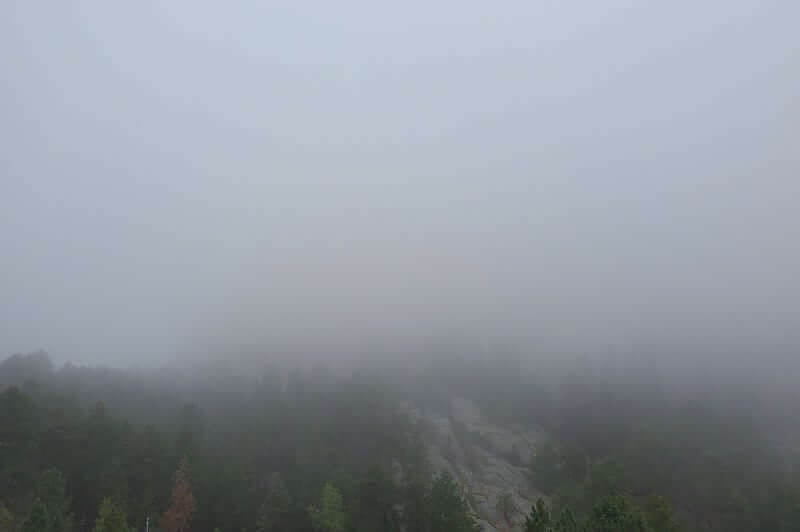 Mount Rushmore in the rain. avenue of flags. Mount rushmore weather. mount rushmore fog. south dakota travel blog