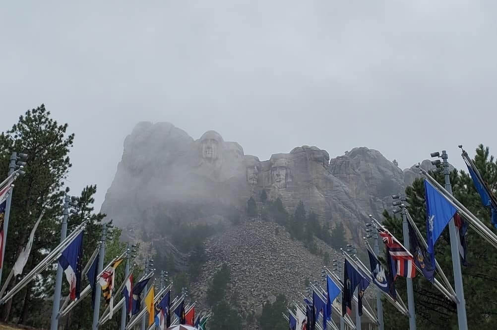 you can see Mount Rushmore in the rain. Mount rushmore weather. mount rushmore fog. south dakota travel blog