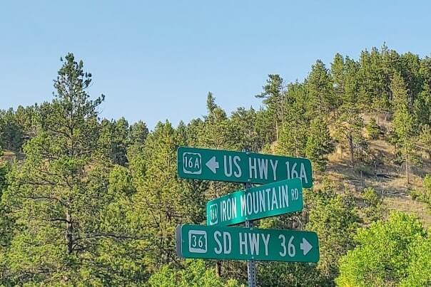 Driving through black hills national forest on iron mountain road to scovel johnson tunnel. south dakota travel blog.