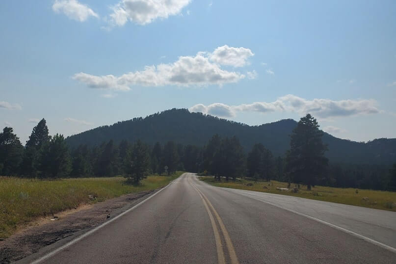 Driving through black hills national forest on iron mountain road to scovel johnson tunnel. south dakota travel blog.