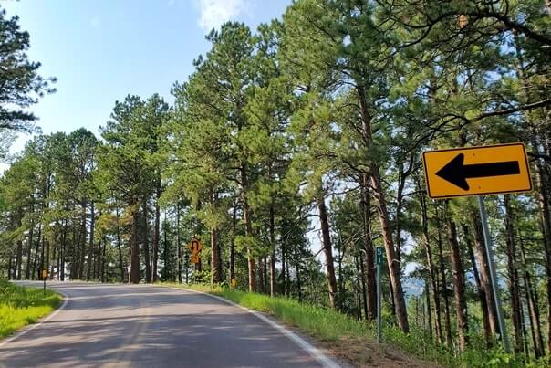 Driving iron mountain road away from scovel johnson tunnel. south dakota travel blog.