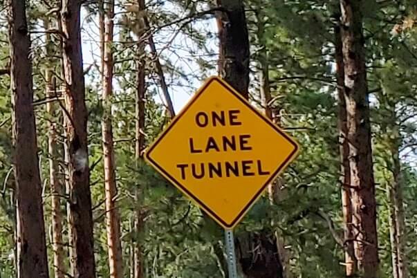 Scovel Johnson Tunnel is a one lane tunnel on Iron Mountain Road. black hills national forest. south dakota travel blog