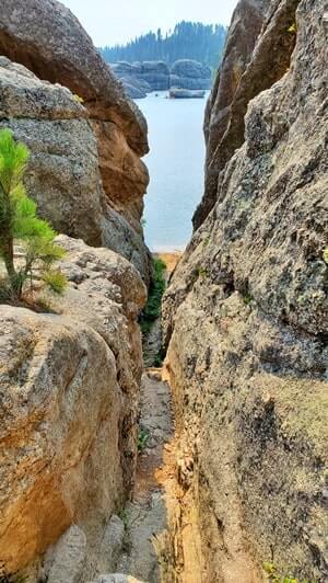 hiking around rocks and boulders at sylvan lake. custer state park rocks in the black hills. south dakota travel blog