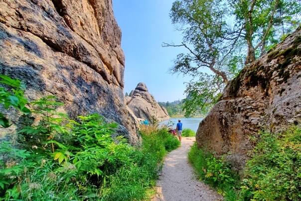 hiking around rocks and boulders at sylvan lake. custer state park rocks in the black hills. south dakota travel blog