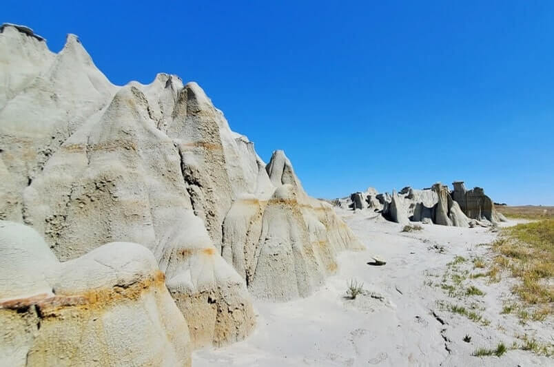 Things to do in Theodore Roosevelt National Park South Unit: hoodoos, hidden caprocks, rock formations along side of road. north dakota travel blog