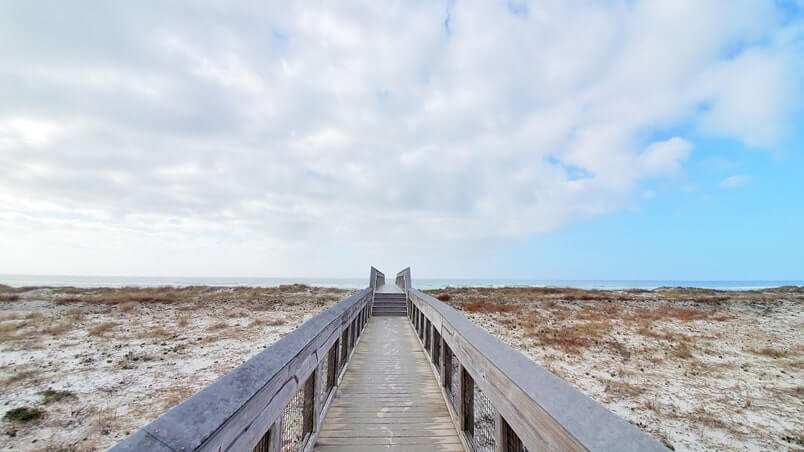 destin dunes boardwalk to henderson beach state park swimming beach. florida travel blog
