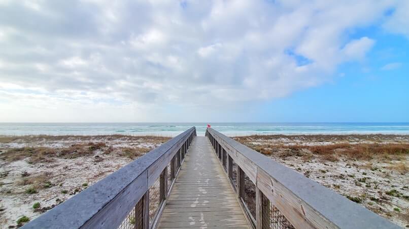 destin dunes boardwalk to henderson beach state park swimming beach. florida travel blog