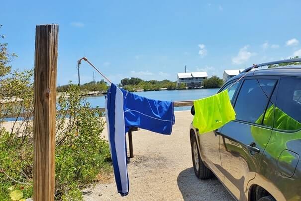 what to wear snorkeling in the florida keys: swimming shirt for snorkeling. rash guard for snorkeling. what to pack for snorkeling in the florida keys. florida keys packing list