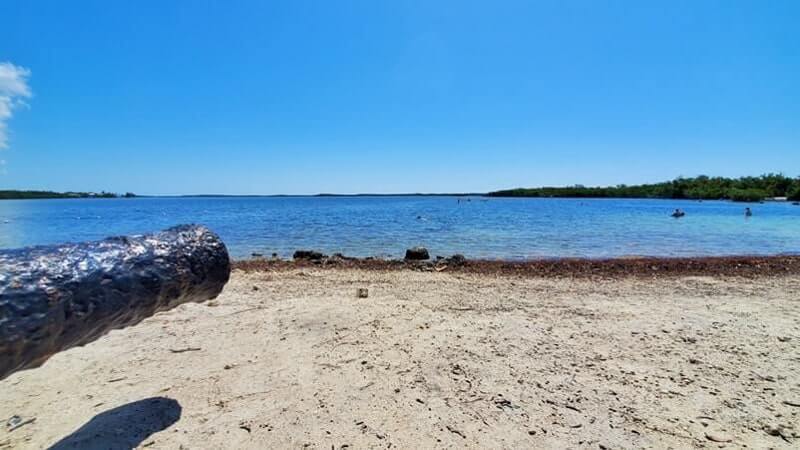 john pennekamp state park beach for swimming: cannon beach swimming area. key largo beach. florida keys travel blog