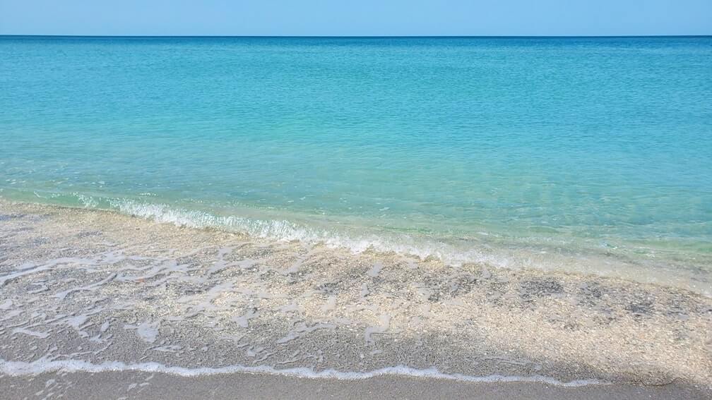 Turner Beach swimming for shells. turner beach swimming for shells. captiva island, gulf coast, southwest florida travel blog