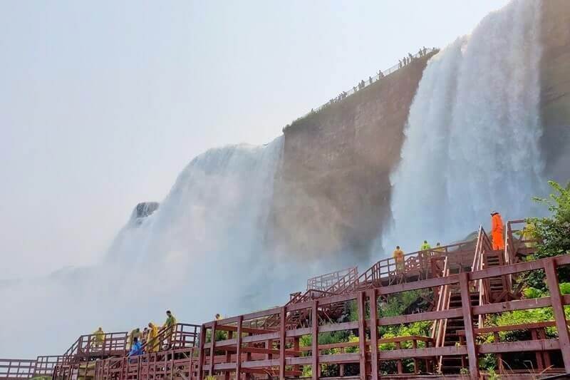 American side of Niagara Falls USA: Cave of the Winds. Bottom of Niagara Falls USA. ny travel blog