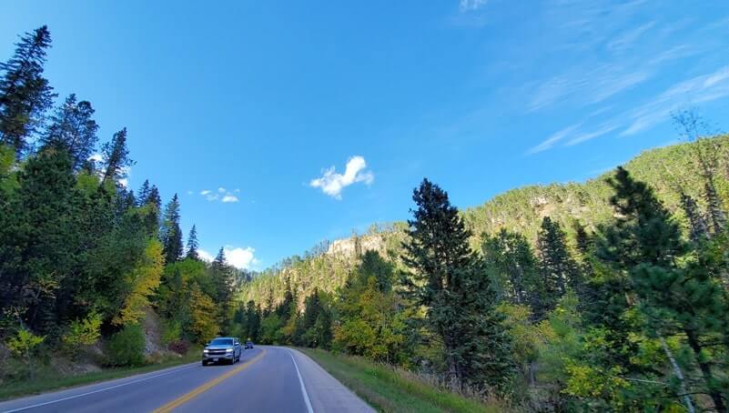driving the spearfish canyon scenic byway to bridal veil falls in black hills national forest. south dakota