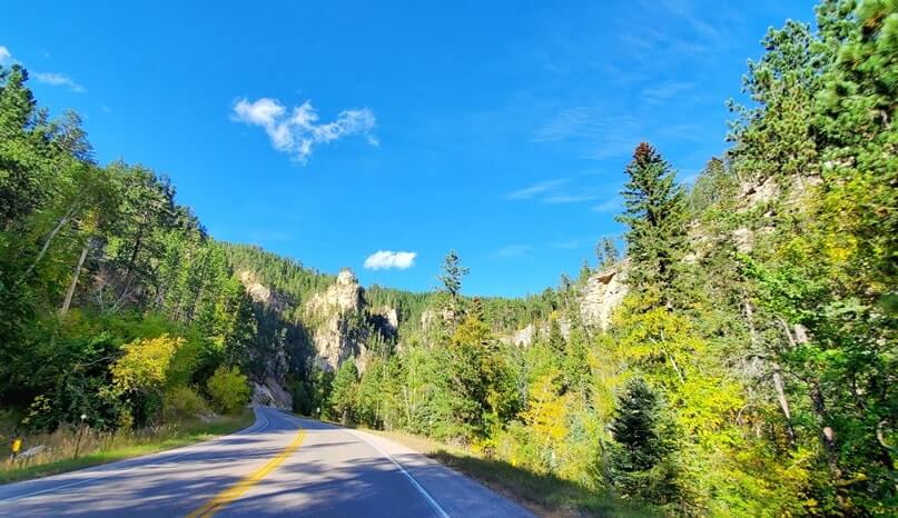 driving the spearfish canyon scenic byway to bridal veil falls in black hills national forest. south dakota
