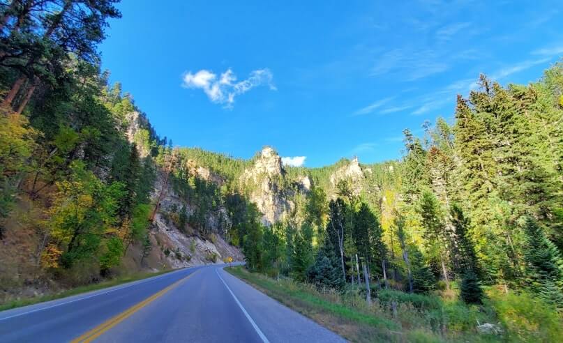 driving the spearfish canyon scenic byway to bridal veil falls in black hills national forest. south dakota