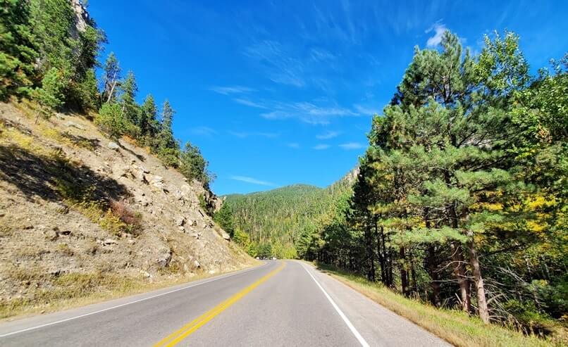 driving the spearfish canyon scenic byway to bridal veil falls in black hills national forest. south dakota