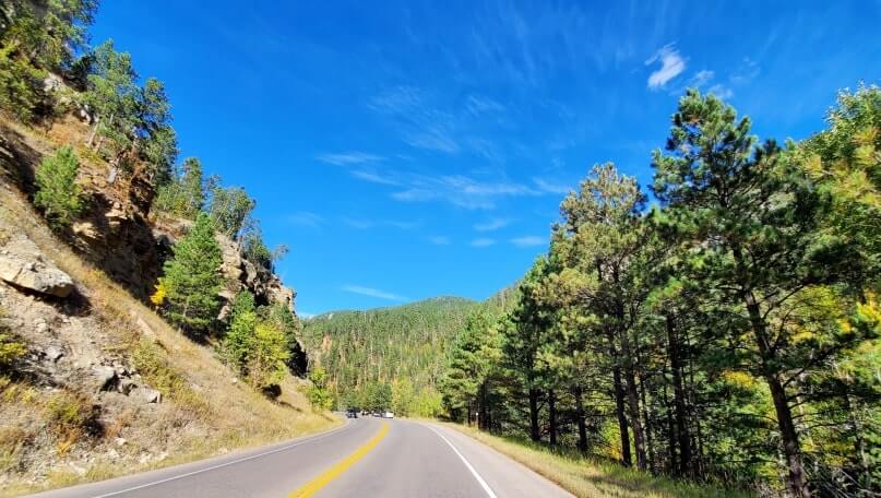 driving the spearfish canyon scenic byway to bridal veil falls in black hills national forest. south dakota