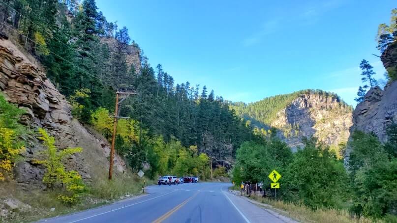 driving the spearfish canyon scenic byway to bridal veil falls in black hills national forest. south dakota