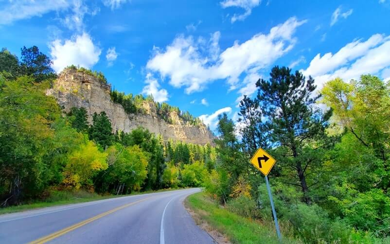 driving the spearfish canyon scenic byway to kissing rocks. savoy to kissing rocks to spearfish. black hills national forest, south dakota