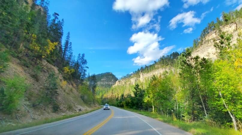 driving the spearfish canyon scenic byway to kissing rocks. savoy to kissing rocks to spearfish. black hills national forest, south dakota