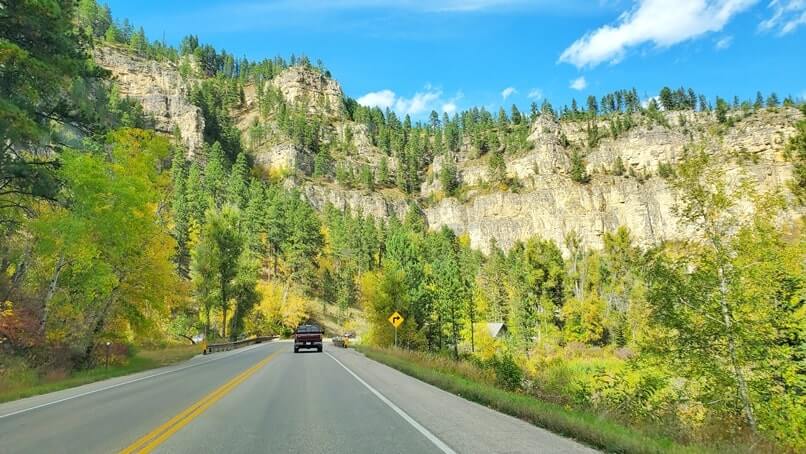 driving the spearfish canyon scenic by way to Long Valley picnic area in spearfish canyon. black hills national forest. south dakota travel blog