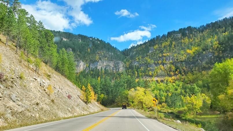 driving the spearfish canyon scenic by way to Long Valley picnic area in spearfish canyon. black hills national forest. south dakota travel blog