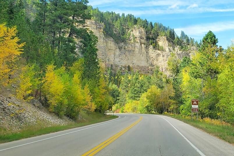 driving the spearfish canyon scenic by way to Long Valley picnic area in spearfish canyon. black hills national forest. south dakota travel blog