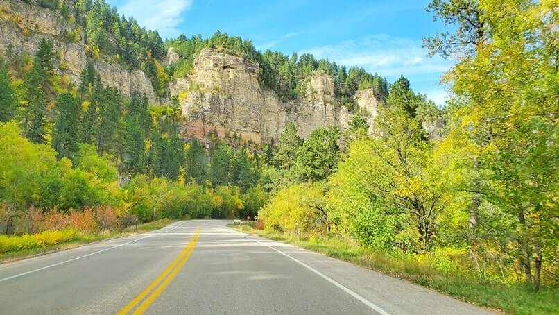 driving the spearfish canyon scenic by way to Long Valley picnic area in spearfish canyon. black hills national forest. south dakota travel blog