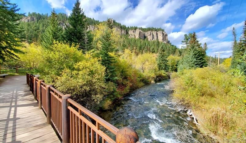 spearfish creek. spearfish falls trail bridge in spearfish canyon, black hills