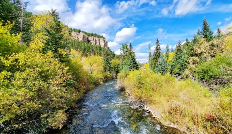 spearfish creek. spearfish falls trail bridge in spearfish canyon, black hills