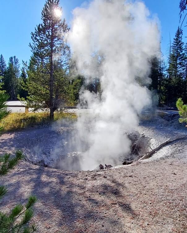 things to do near yellowstone national park south entrance: bubbling mud at west thumb parking lot