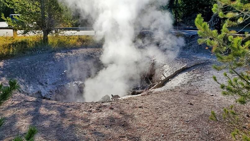 things to do near yellowstone national park south entrance: bubbling mud at west thumb parking lot
