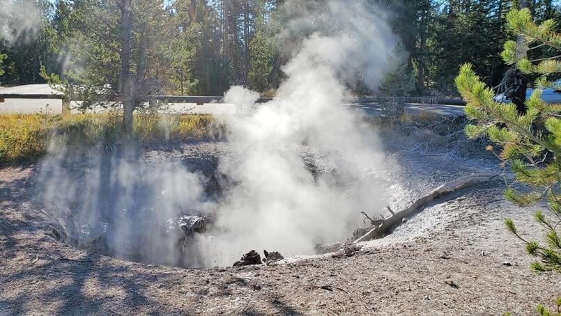 things to do near yellowstone national park south entrance: bubbling mud at west thumb parking lot