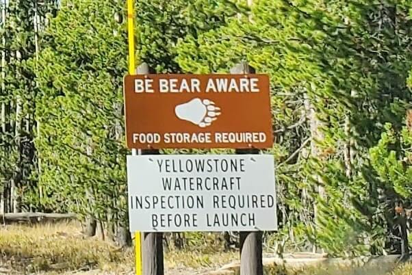 wildlife sign, yellowstone national park road from south entrance. yellowstone national park drive