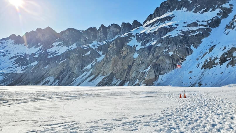 alaska helicopter tour with glacier landing, dog sledding camp.