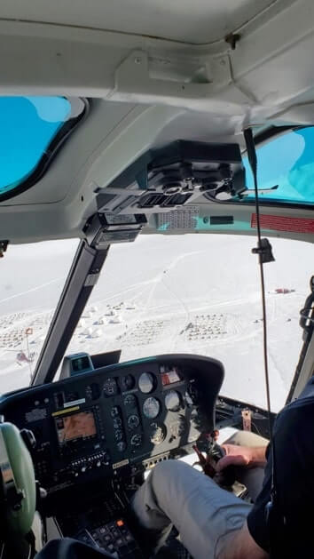 alaska helicopter tour to glacier dog sledding glacier camp. denver glacier sled dog camp