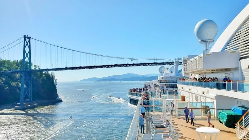lions gate bridge, vancouver. sailing under lions gate bridge on a cruise ship